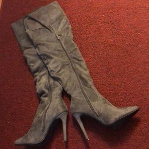 Knee high heeled boots
